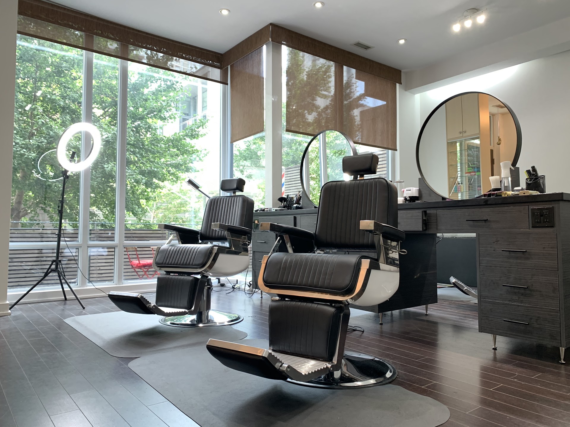 Ako Barbershop interior with barber chairs and mirrors